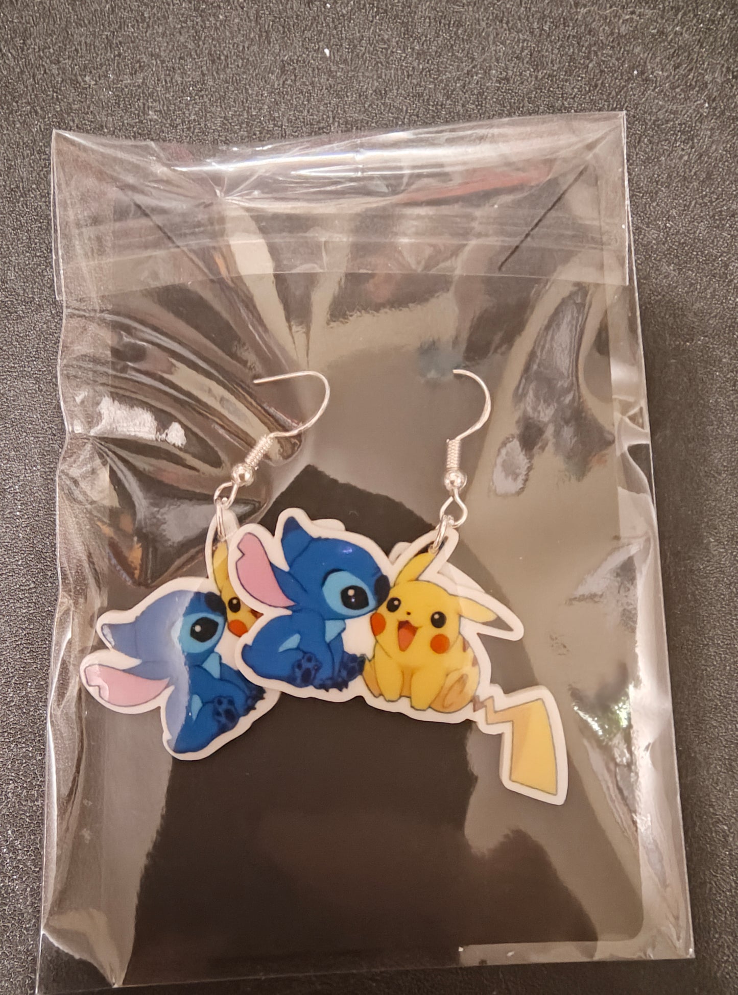 Blue Alien and Yellow Lighting Bolt