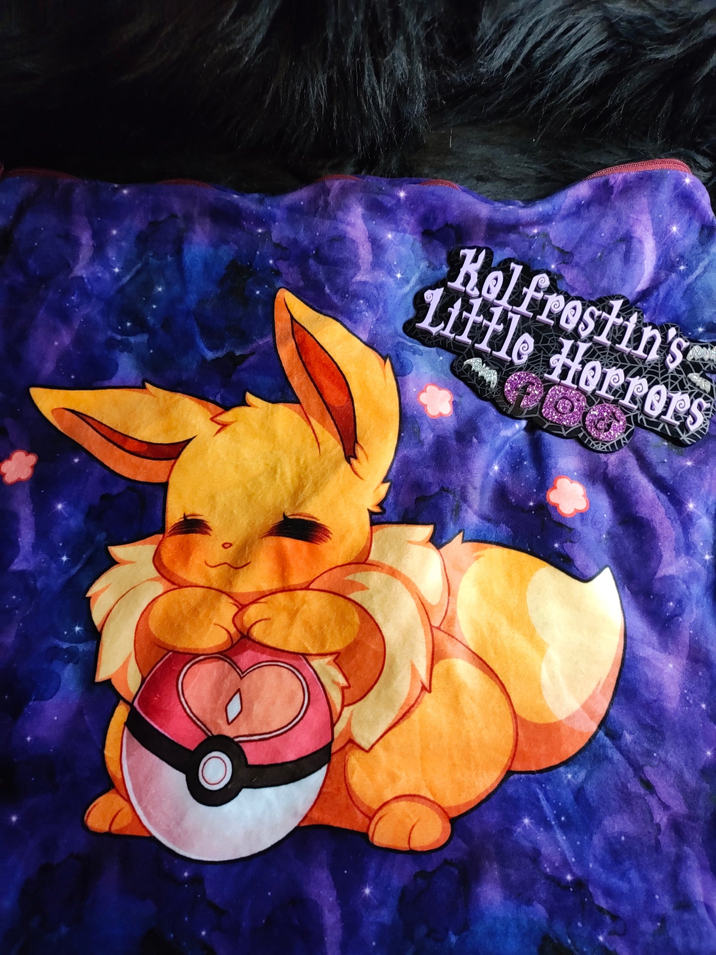 Little floofball with ball.